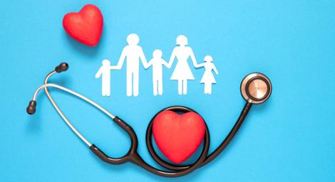 image of a stethscope, a heart and a paper cut out family